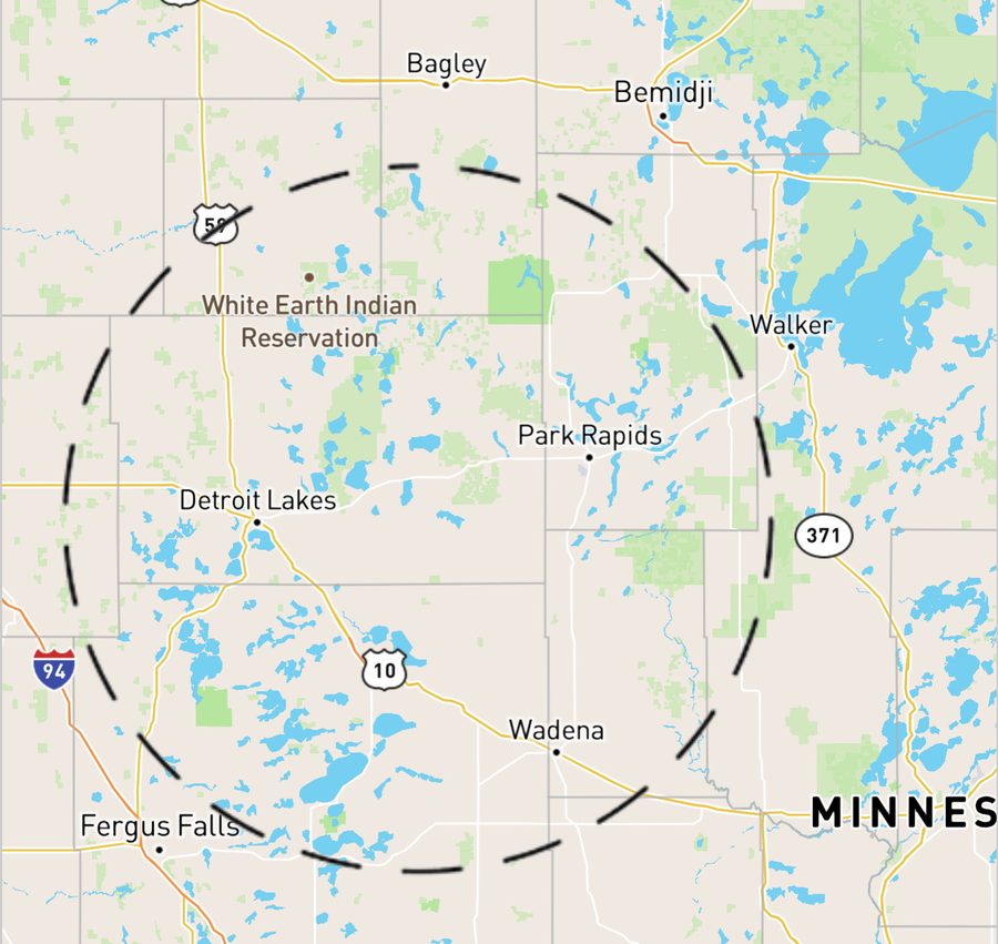 Map of the lakes region around Detroit Lakes, Minnesota, with a dashed circle marking the service area